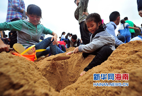 海口500台相机埋假日沙滩游客可寻宝