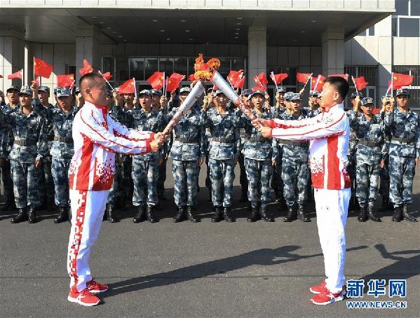 （军运会·图文互动）（5）第七届世界军人运动会火炬传递活动在空军航空大学举行