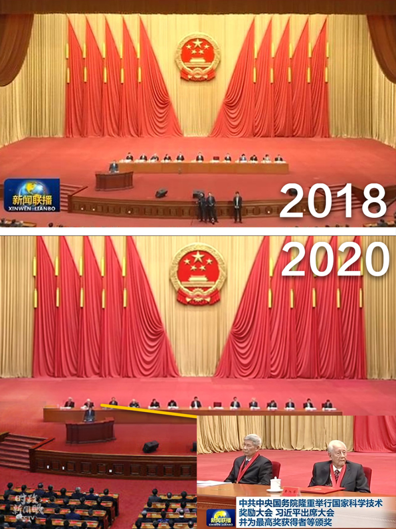 △今年,两位国家最高科学技术奖获得者在主席台上就座.